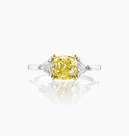 
                                                                                    Evidence 1922 ring, exceptional piece in white and yellow gold with cushion-cut Fancy Vivid Yellow diamond and triangular diamon
                                                                            