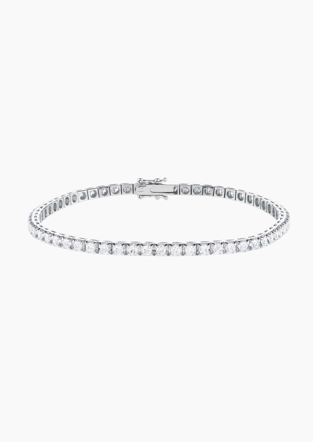 
                                                                                    Evidence diamond rivière bracelet in white gold – Maison Lepage, French jeweler and designer since 1922.
                                                                            