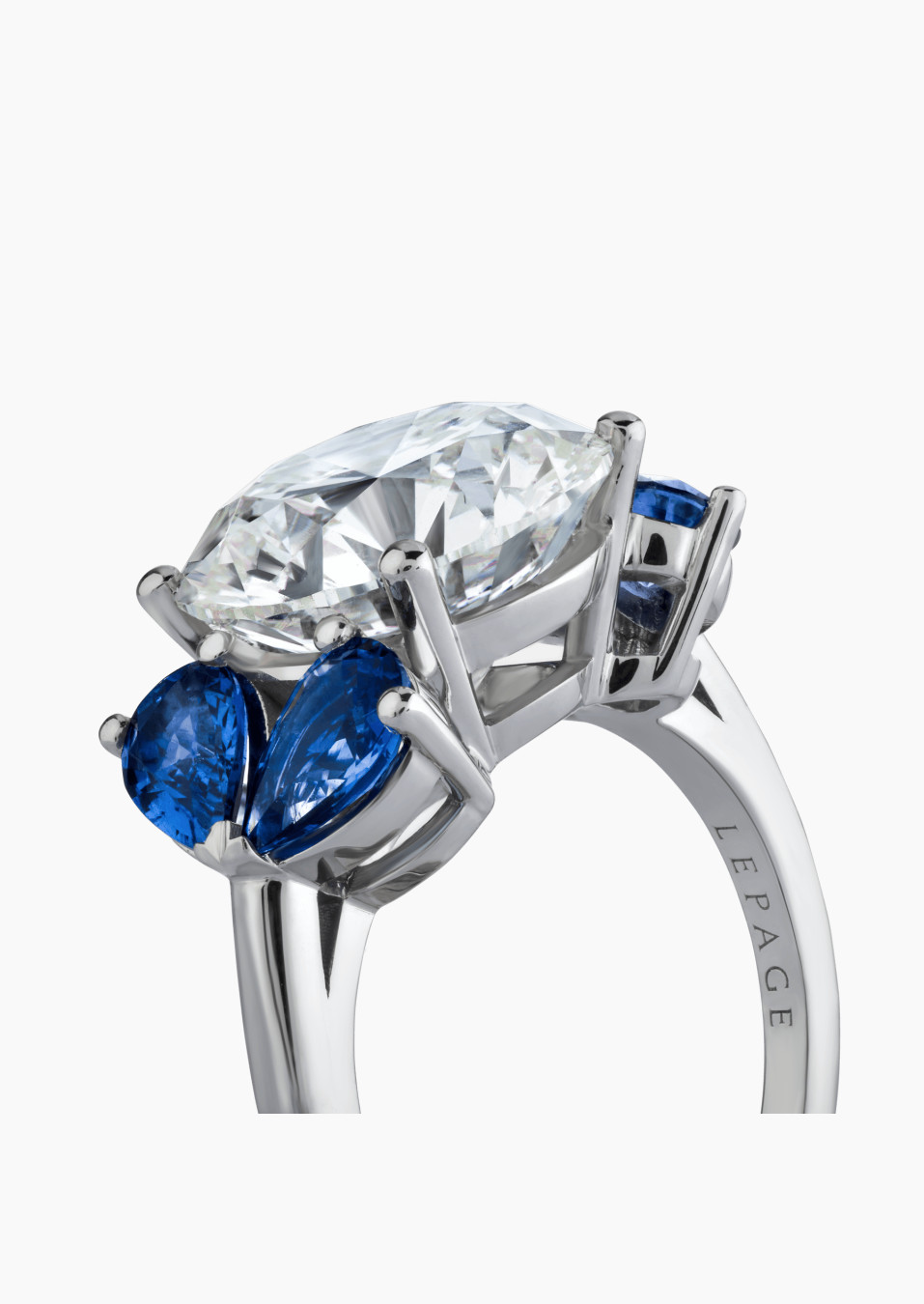 L’Éternelle ring in white gold, 5.62-carat diamond and pear-shaped blue sapphires – Maison Lepage, jeweler and designer since 19