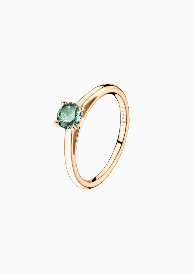 
                                                                                    1922 solitaire ring - Green sapphire
                                                                            