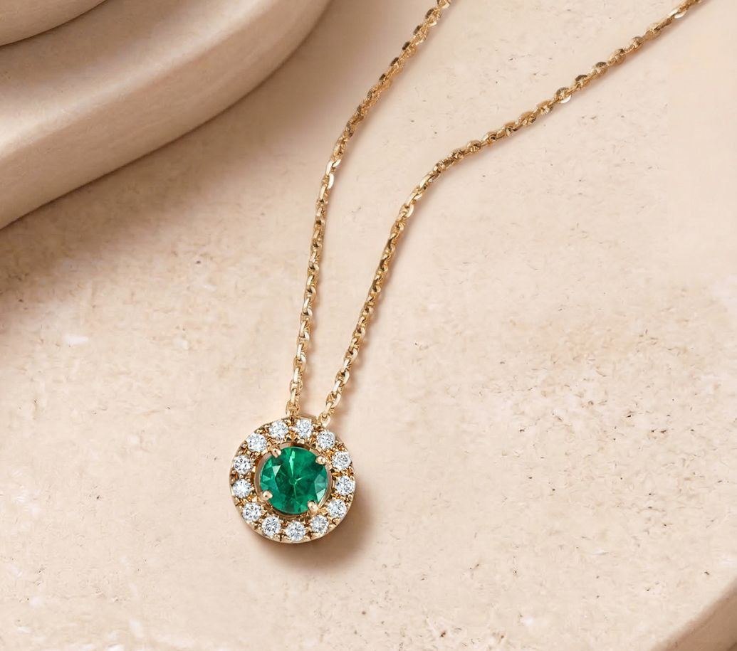 collier coquette en or et émeraude