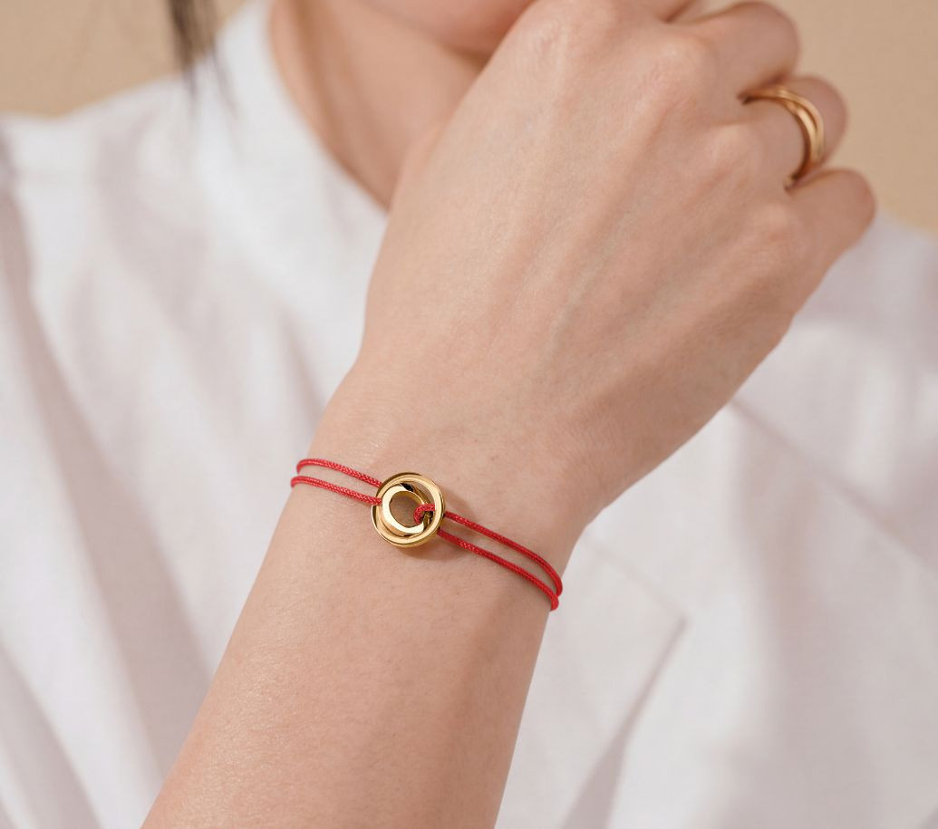 bracelet alba or jaune et cordon rouge