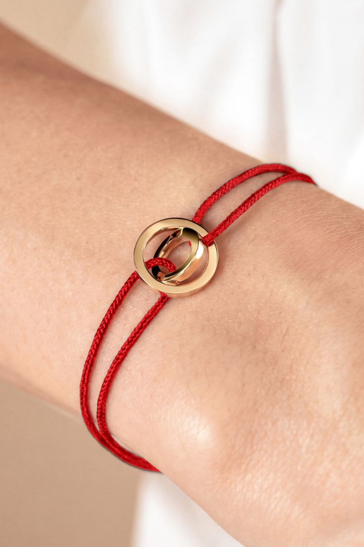 bracelet alba or jaune et cordon rouge